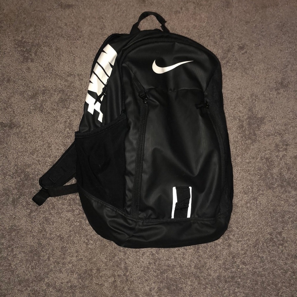 Black and white nike athletic/backpack